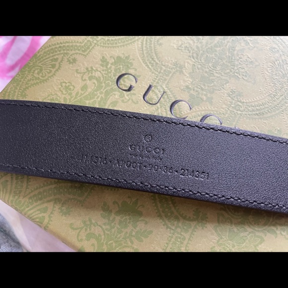 Gucci black logo belt.